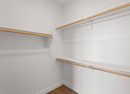 Empty room with two shelves.
