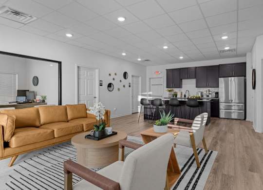 a living room and kitchen in a modern apartment