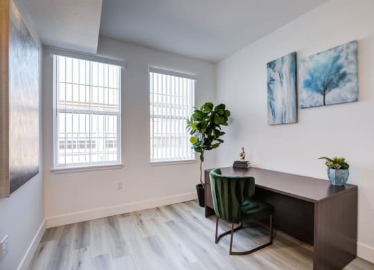 the preserve at ballantyne commons living room with desk and chair and windows