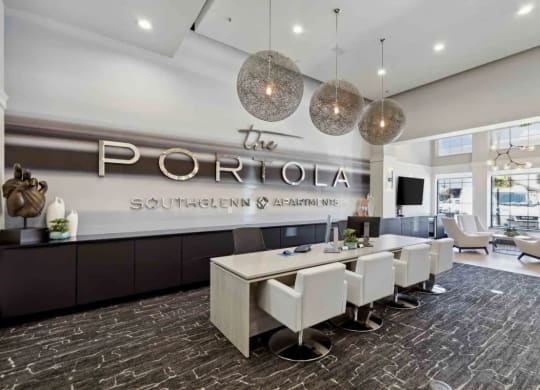a conference room with a long table and chairs