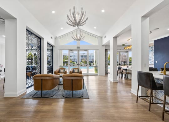 club house area with couches and a table with chairs