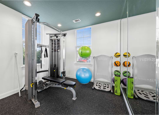 fitness room with exercise equipment
