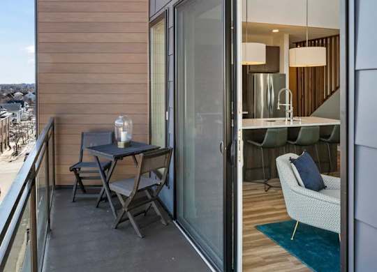 Balcony with slider door to living room