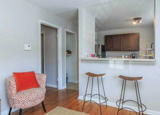 a kitchen and living room in a 555 waverly unit