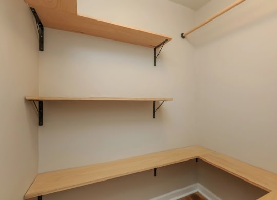 a walk in closet in a 555 waverly unit