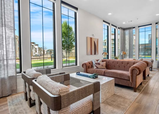 a living room with couches and a coffee table