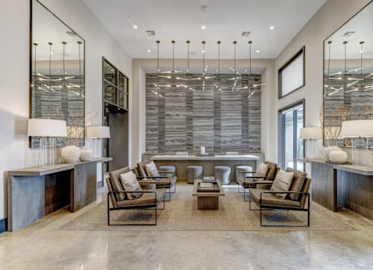 A modern living room with a large window and a long table.