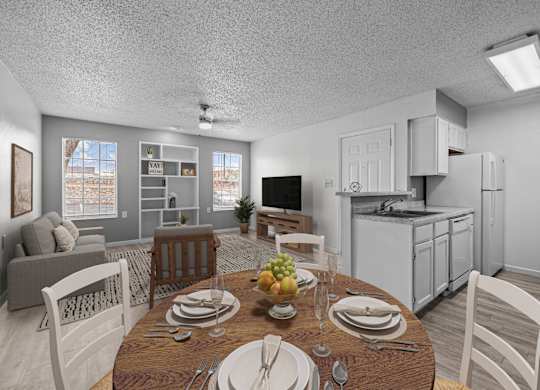 A dining room with a table set for a meal.
