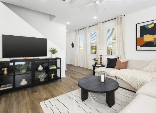 a living room with a couch and a coffee table