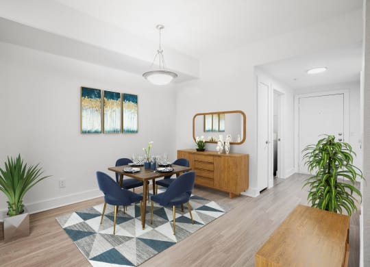 A dining room with a set of chairs and a table