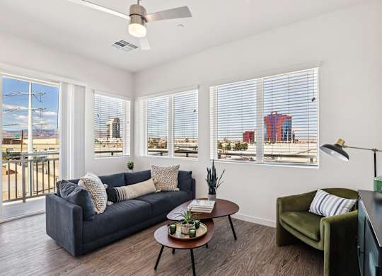 Living Room With Ceiling Fan at Lura Vegas Apartments, Nevada, 89103