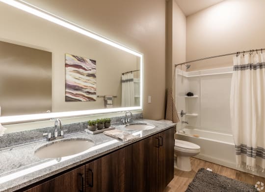 Bathroom with LED mirrors at Brownstone Apartments, Nevada, 89131