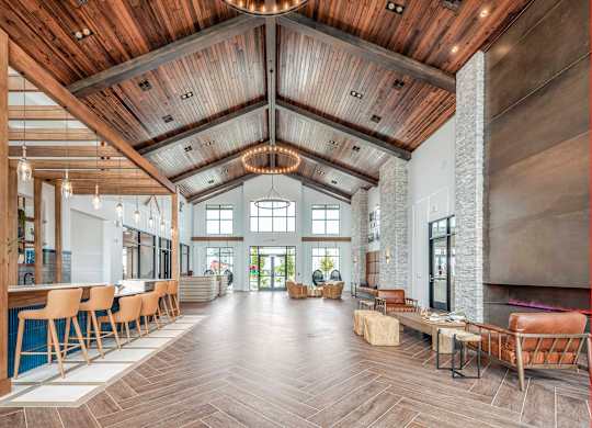 A large open space with wooden floors and a high ceiling.