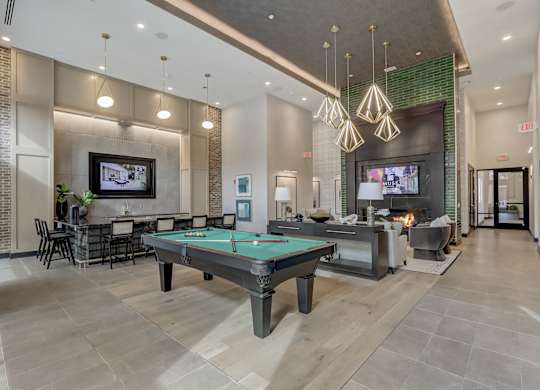 play a game of pool in our clubhouse at our apartments