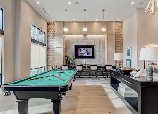 pool table in clubhouse at the estates apartments