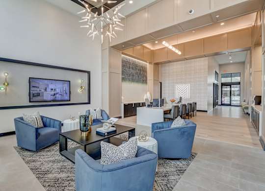 a living room with couches and a coffee table