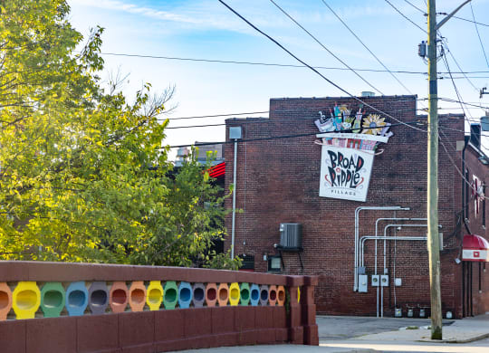 a brick building with a sign on the side of it