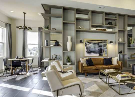 a living room with a couch and a table at Echo Park at Perry Crossing Apartments, Plainfield, Indiana