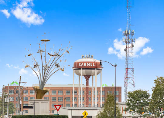 a water tower on top of a building in the city at Providence at Old Meridian Apartments , Carmel, Indiana