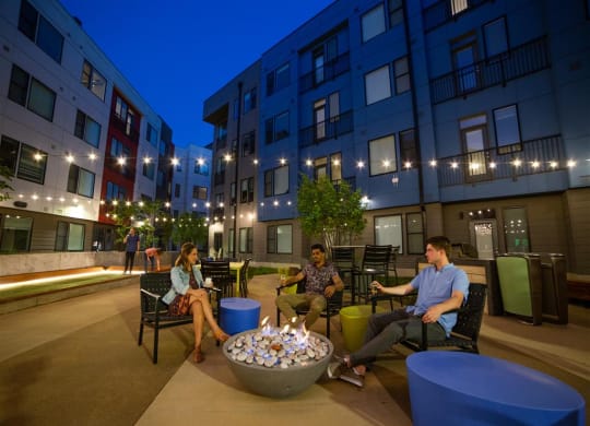 Outdoor seating areas in phase two with fire pits, grills and lighting