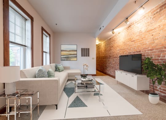 Decorated living room at Lockerbie Court on Mass Ave Apartments, Indianapolis, IN