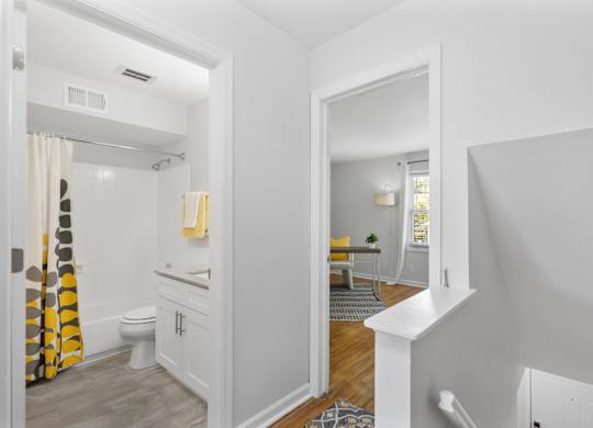 Upstairs hallway view at Monon Living showcasing easy access between bedrooms and bathroom in a pet-friendly Broad Ripple apartment near the Monon Trail.