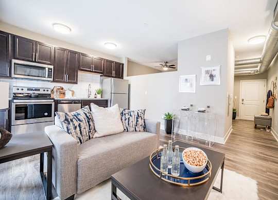 Living Room With Kitchen View at The Foundry, South Bend, 46617