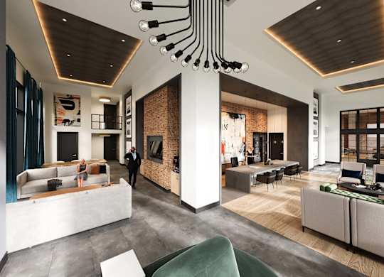 Modern leasing office at Contrast OTR in Cincinnati, Ohio, showcasing high ceilings, contemporary design elements, industrial-inspired lighting, and comfortable seating areas for residents and guests