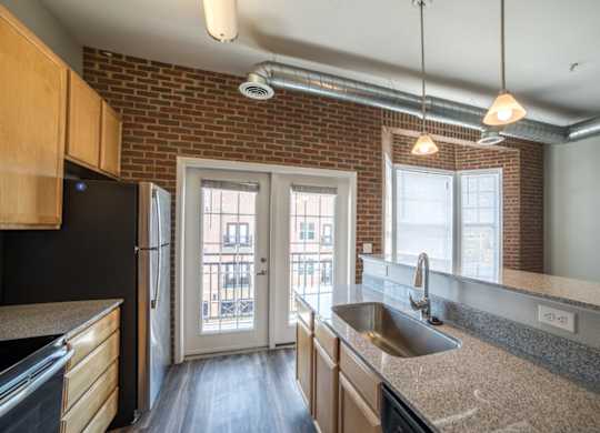 Stainless Steel Sink With Faucet In Kitchen at Providence at Old Meridian, Carmel, Indiana