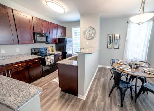 Kitchen and dining at Providence at Old Meridian Apartments , Indiana