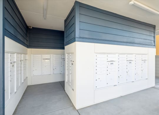 a locker room with lockers and a row of mailboxes at 38° NORTH, Santa Rosa, 95404 