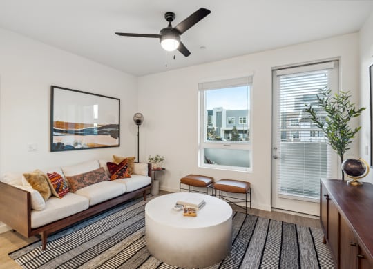 a living room with a couch and a coffee table and a ceiling fan at 38° NORTH, Santa Rosa, 95404