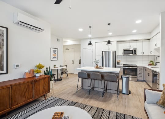 a living room with a kitchen and a table with chairs at 38° NORTH, Santa Rosa, CA 95404