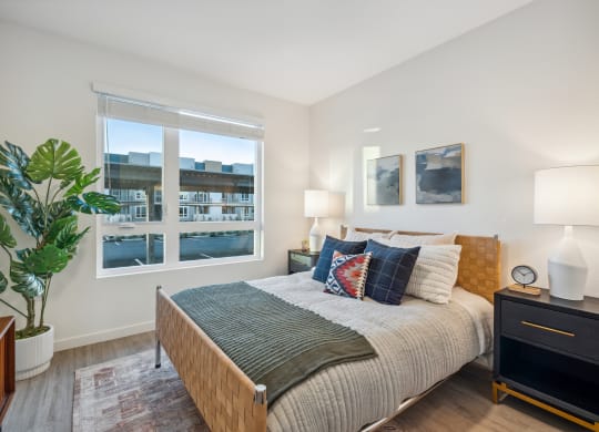 a bedroom with a bed and a large window at 38° NORTH, California, 95404