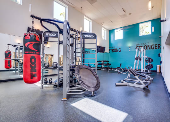 Gym with strength equipment at BELLA VISTA AT HILLTOP, Richmond, 94806