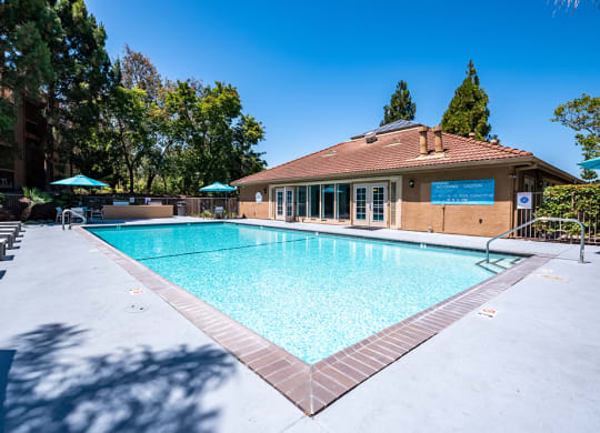 Exterior View of Bella Vista at Hilltop Apartments Building With View of Pool at BELLA VISTA AT HILLTOP, California, 94806