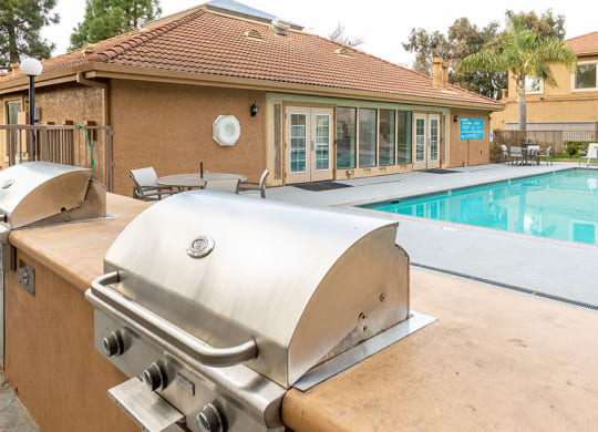 Pool with BBQ and Table at BELLA VISTA AT HILLTOP, California, 94806