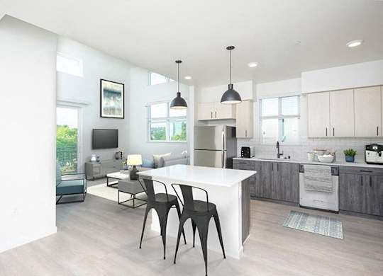A modern kitchen with a dining table and chairs. at 38° NORTH, California, 95404