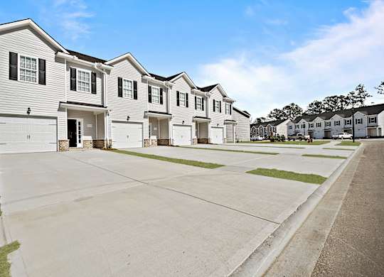 Cottonvale Towns in Savannah, GA photo of exterior of townhomes
