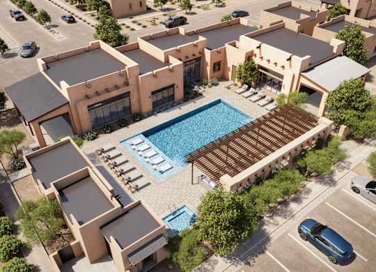 A modern building with a pool in the middle of it.
