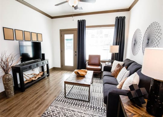 a living room with a couch and a tv