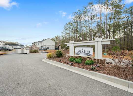 tHarris Trail Luxury Townhomes for rent Richmond Hill, GA photo of monument sign