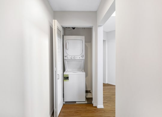 a room with a washer and dryer in it