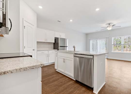 Cottonvale Towns in Savannah, GA photo of kitchen with open concept view of living room