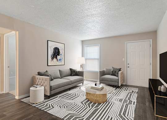 Spacious living room with large window and sleek wood-style plank flooring at Mableton Ridge Apartments in Mableton, GA, near Douglasville.