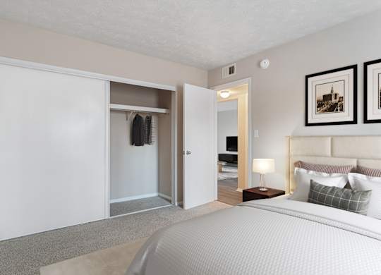 Bedroom with large sliding-door closet at Mableton Ridge Apartments in Mableton, GA, near Douglasville