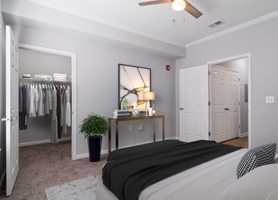 The Asher at Sugarloaf apartments in Lawrenceville Georgia photo of bedroom with ceiling fan
