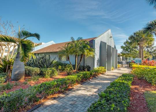 Modern leasing office exterior at Belara Lakes apartment community in Tampa’s Egypt Lake / Lowry Park area