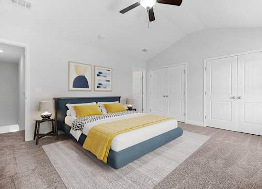 Cottonvale Towns in Savannah, GA photo of a bedroom with a bed and a ceiling fan