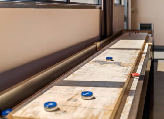 a row of pins on a table in a room
